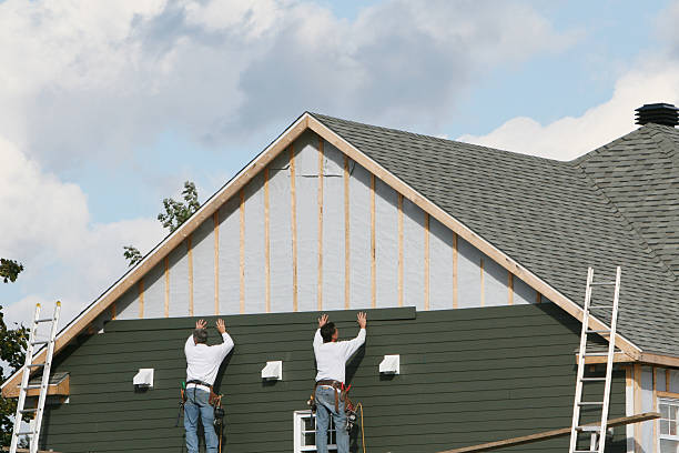 Professional Siding Installation technician working in Falmouth, VA